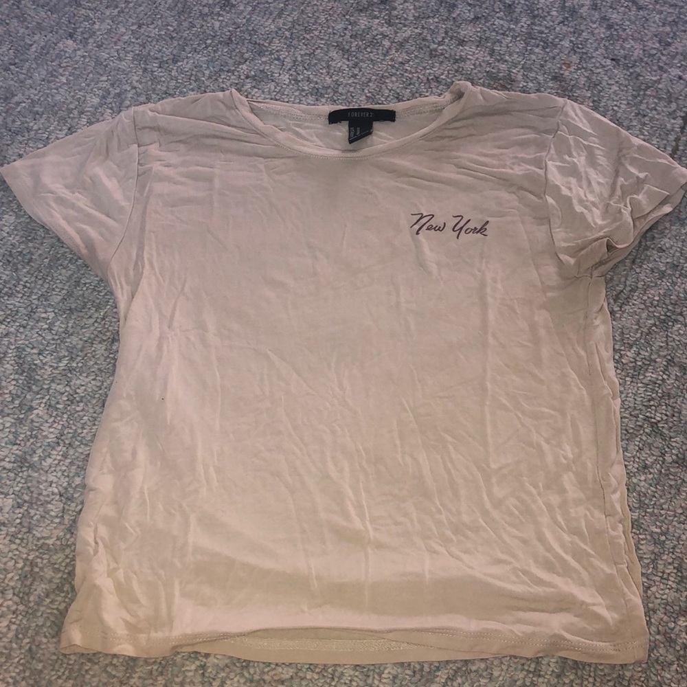 tan short sleeve shirt